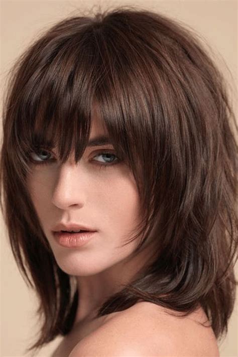 Medium layered haircuts with fringe - Jan 17, 2024 · All Kinds Of Hairstyles With A Fringe 1. Arched Fringe With Point Cut Ends. Catherine Bell’s disconnected bob is layered with a razor to achieve the awesome... 2. Straight Jagged Fringe For A Layered Haircut. Here is a nice haircut idea for brunettes with straight hair. Carly Rae... 3. Blunt Fringe. ... 